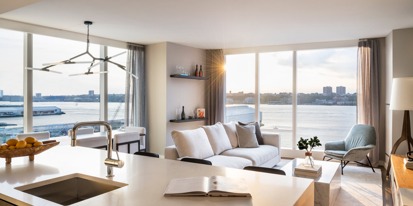 rental living room with river views hero