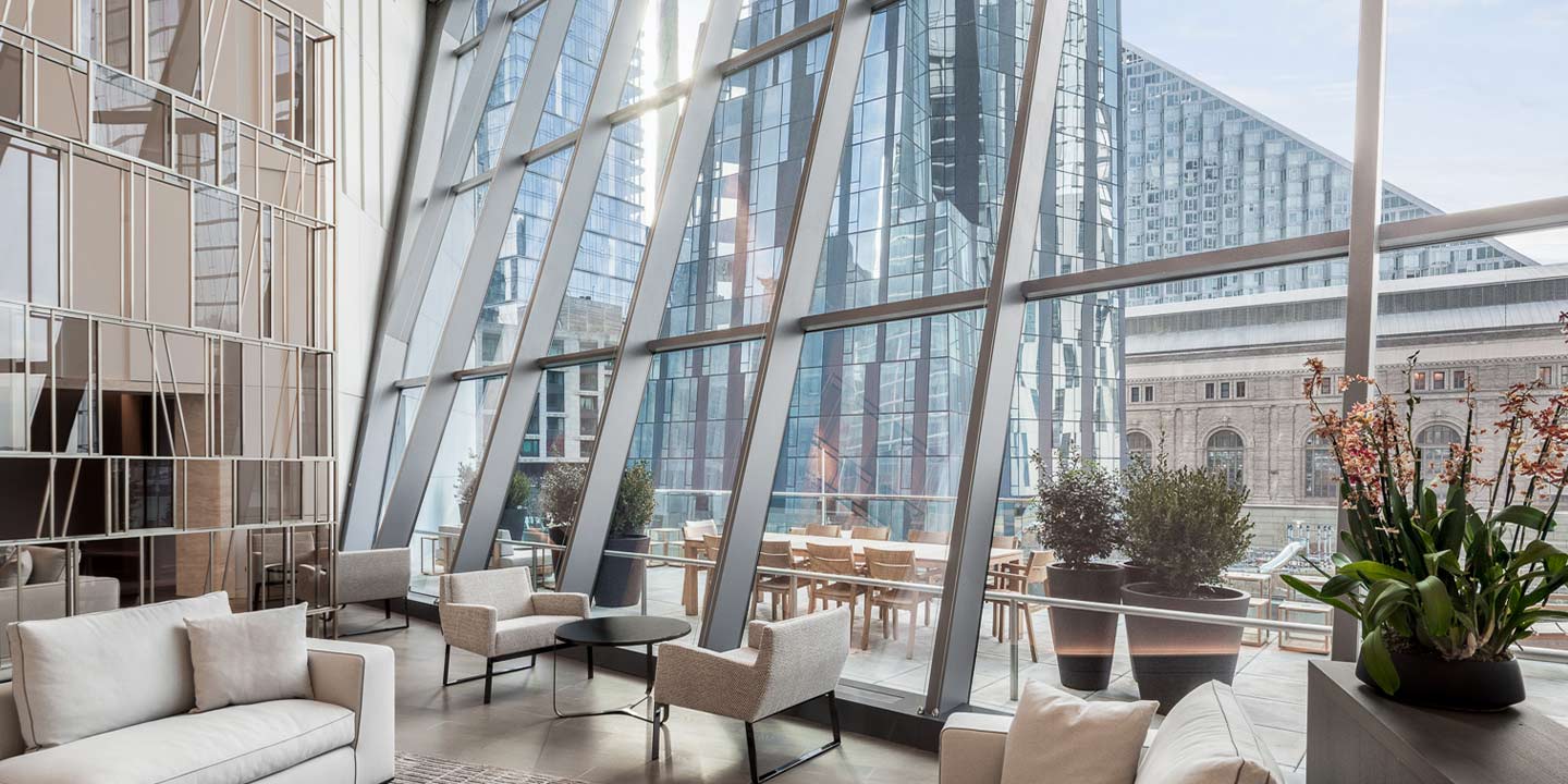 rental lobby interior with soaring windows hero